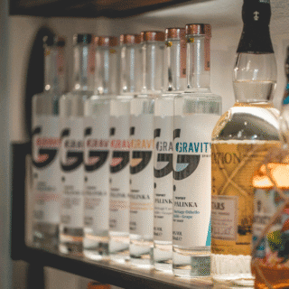 Pálinka bottles on a shelf